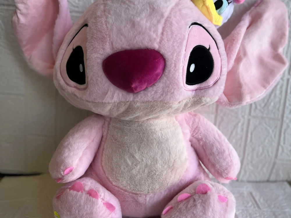 Peluche Angela con pato en la cabeza 60 cm
