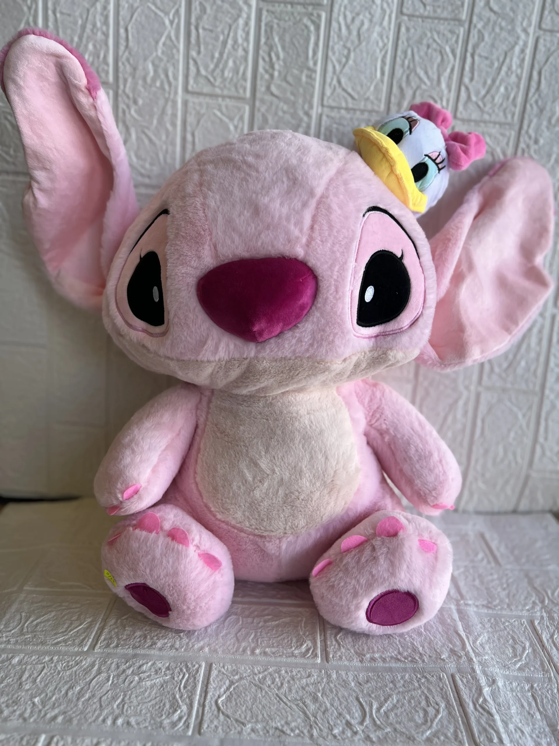 Peluche Angela con pato en la cabeza 60 cm