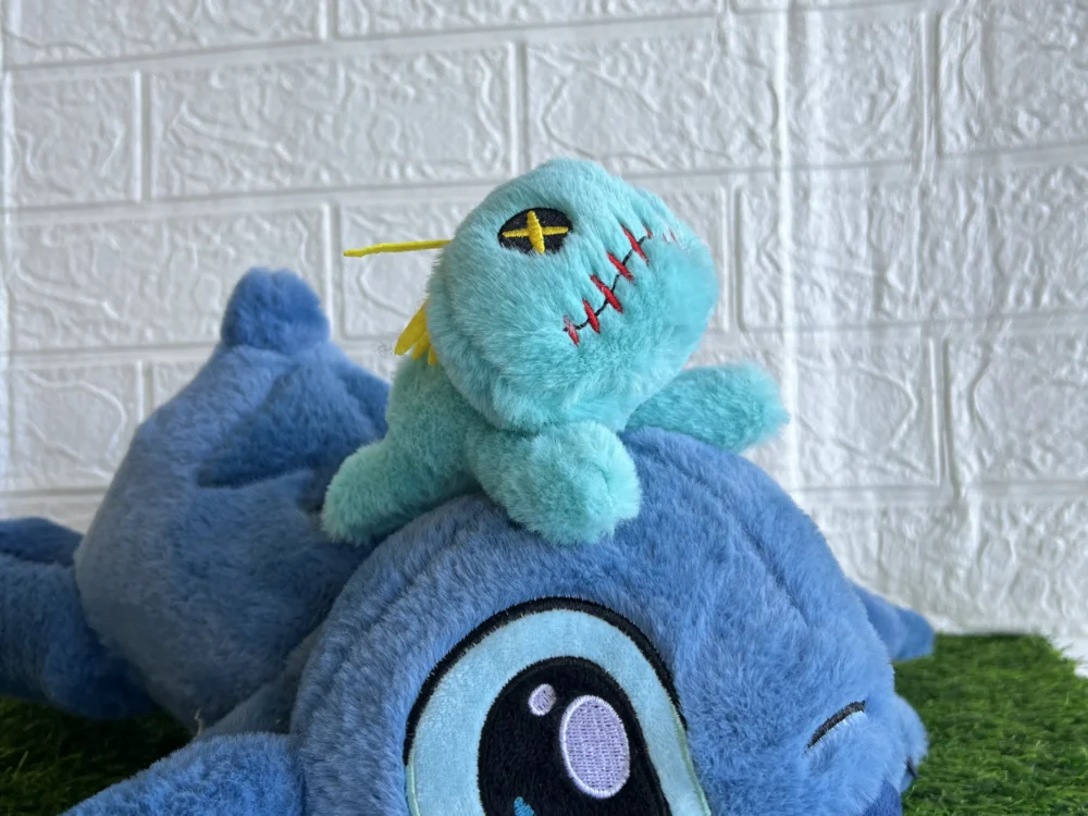 Peluche Stitch con muñeco de trapo