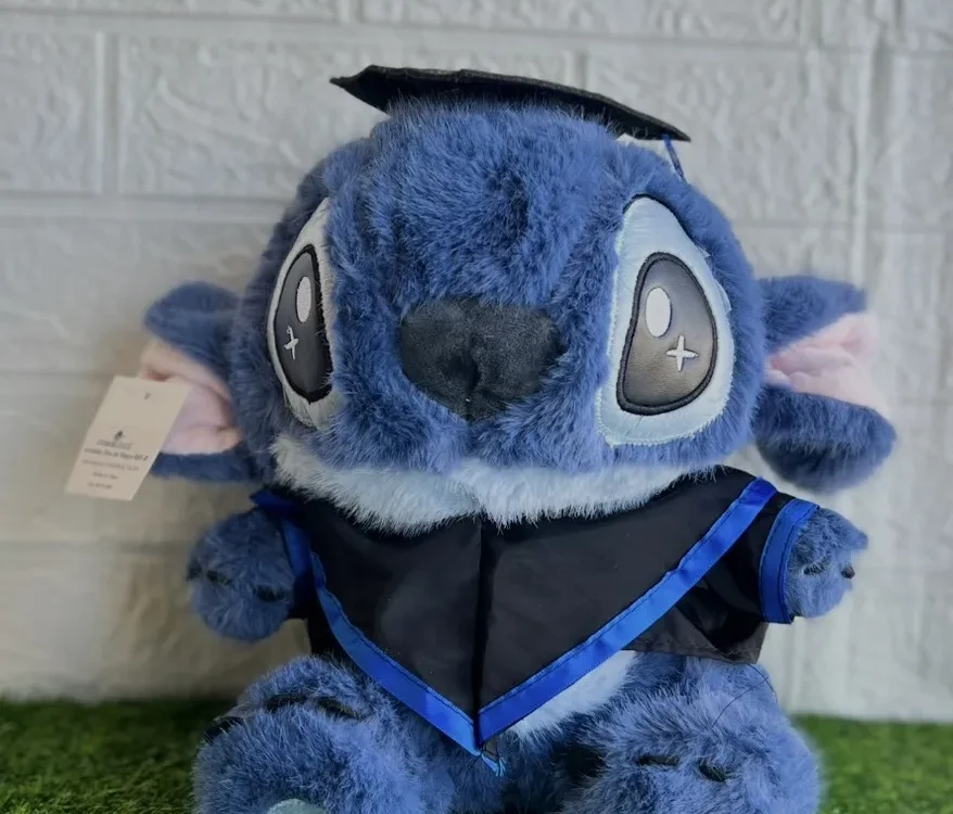 Peluche Stitch con disfraz de graduación 30 cm