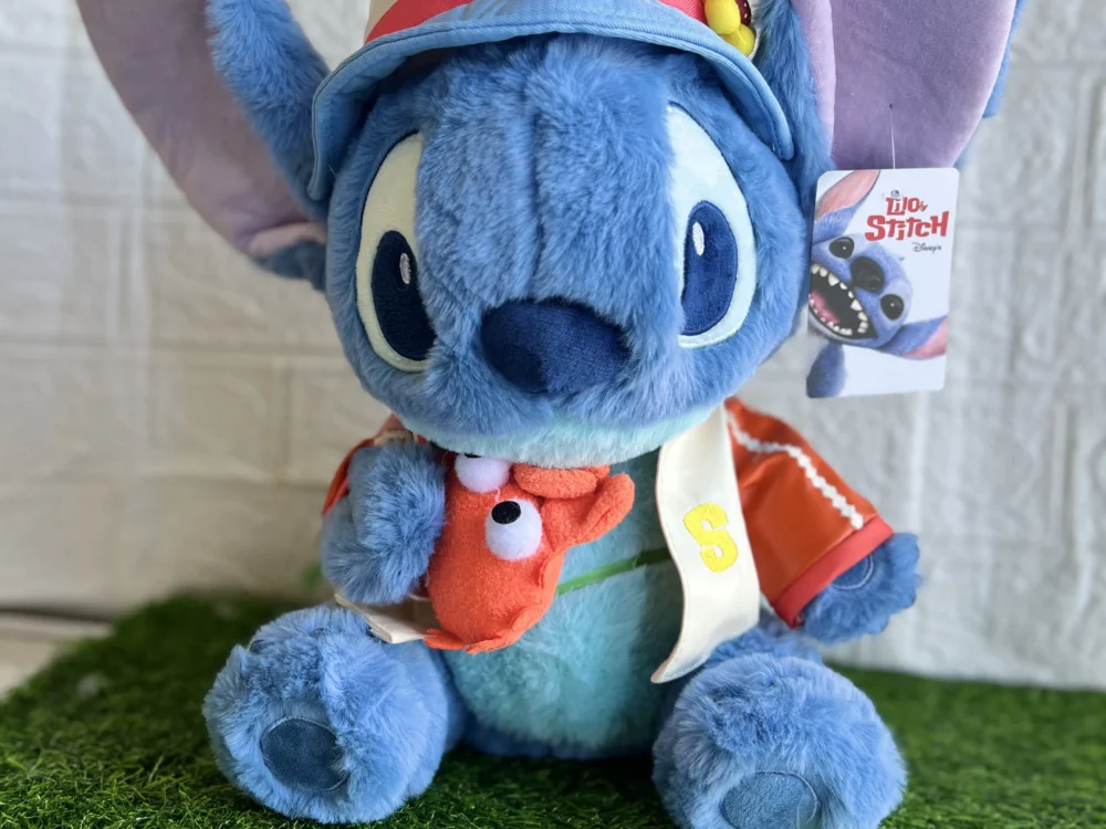 Peluche Stitch con cangrejo