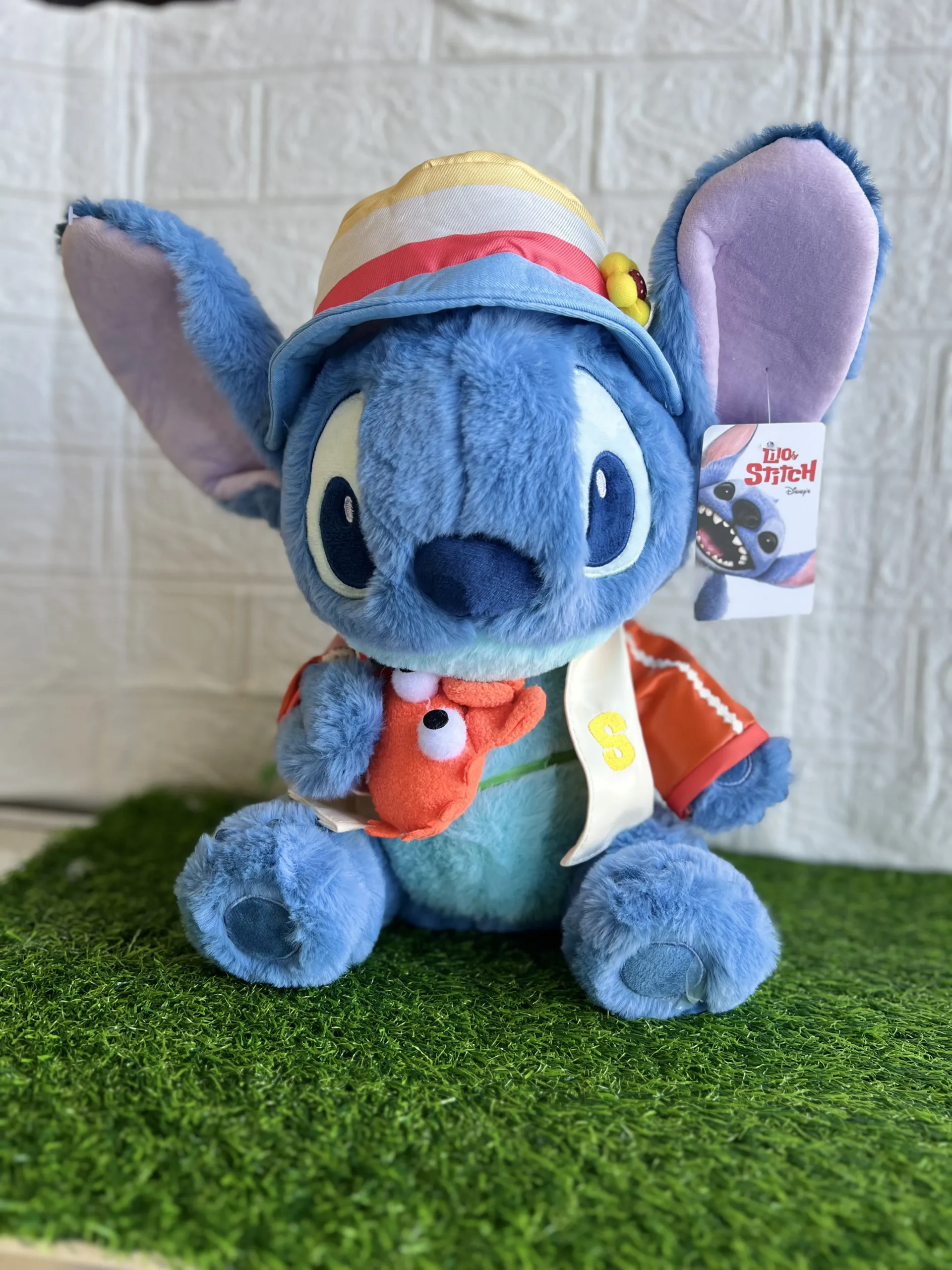 Peluche Stitch con cangrejo